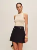 Hollow Sleeveless Knit Top sold by COMMENSE