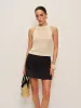 Hollow Sleeveless Knit Top sold by COMMENSE