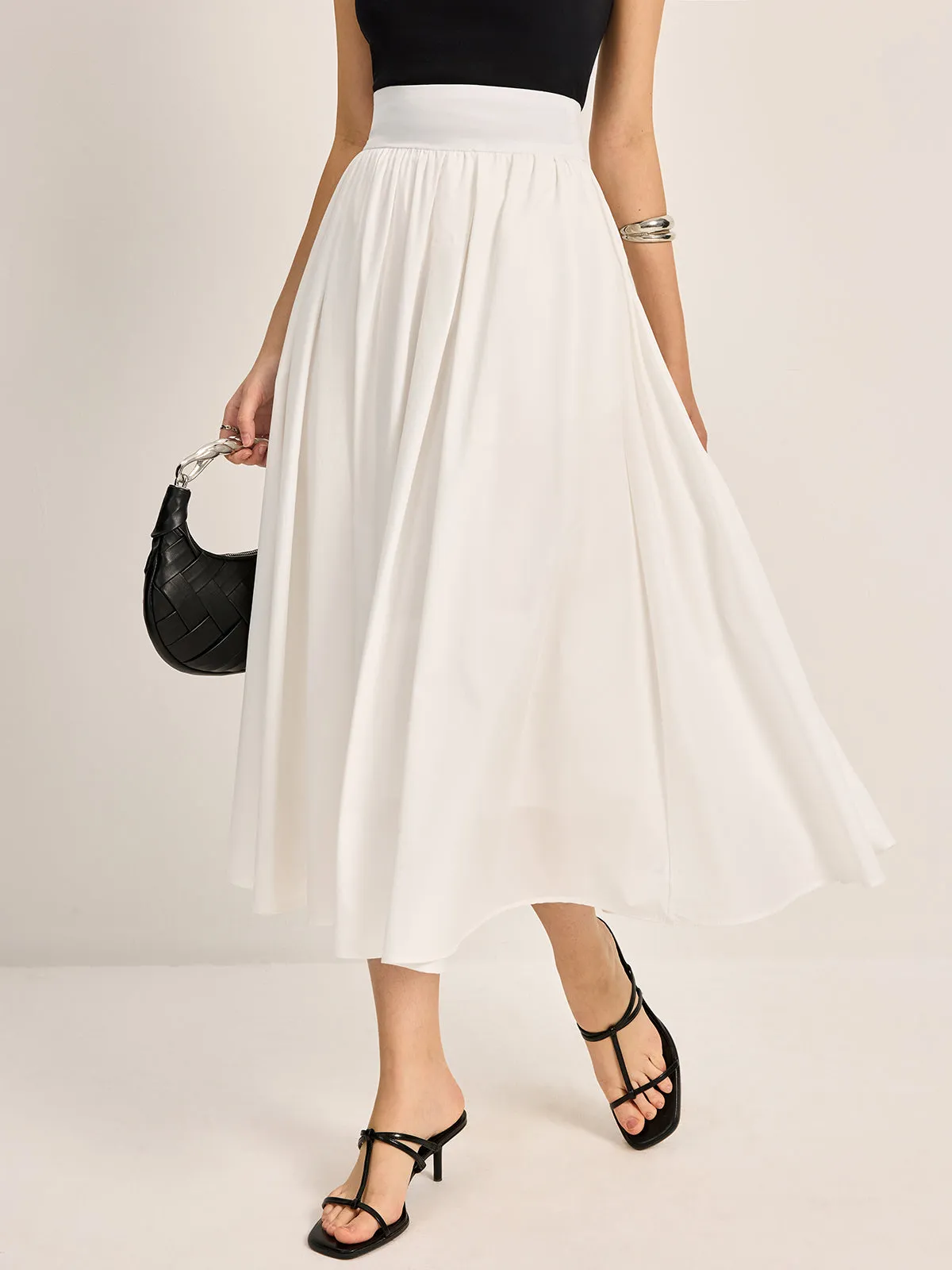Semi-Sheer Elegant A-Line Pleated Skirt sold by COMMENSE