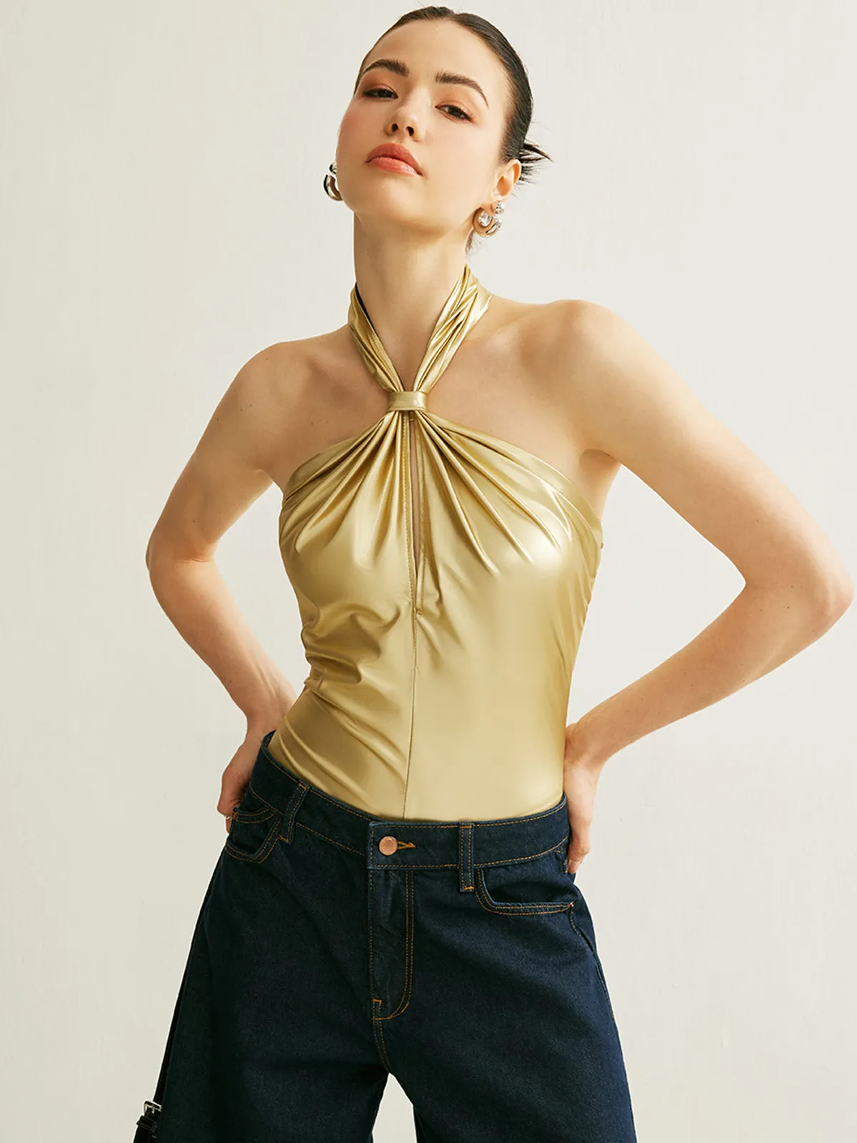 PU Cross-Back Halter Bodysuit sold by COMMENSE