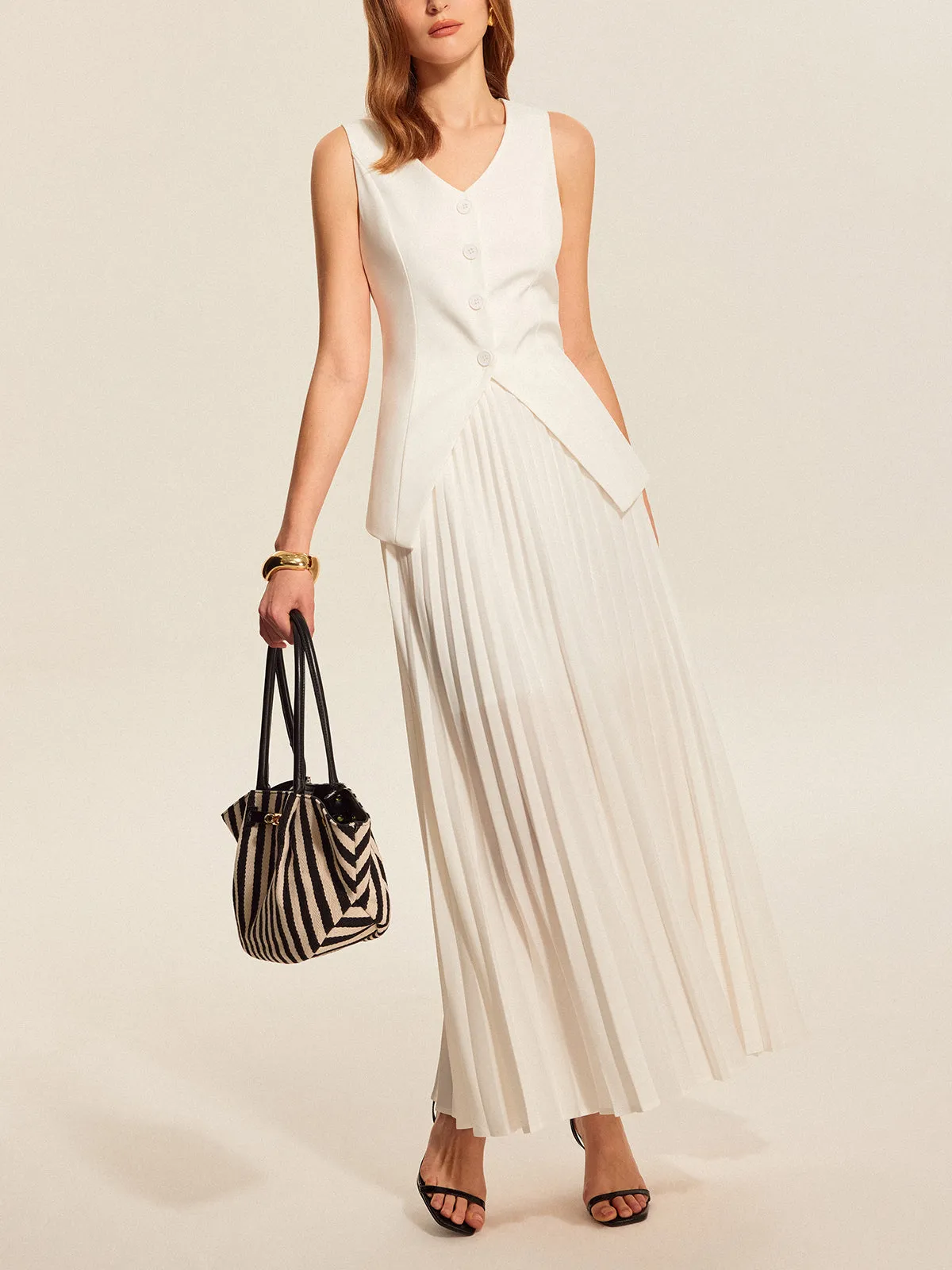 Buttoned Vest Pleated Skirt Set sold by COMMENSE