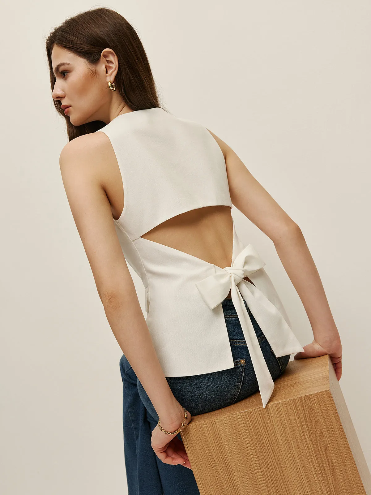 Bow Back Detail Sleeveless Top sold by COMMENSE