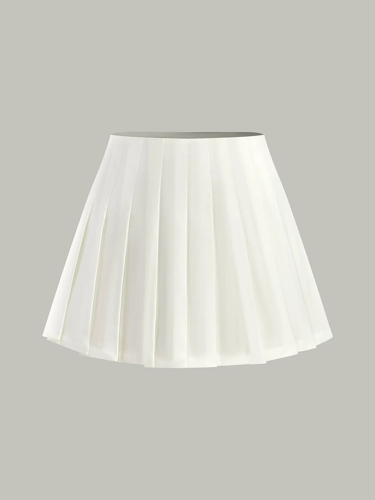 Mid-Waisted Pleated Skirt sold by COMMENSE