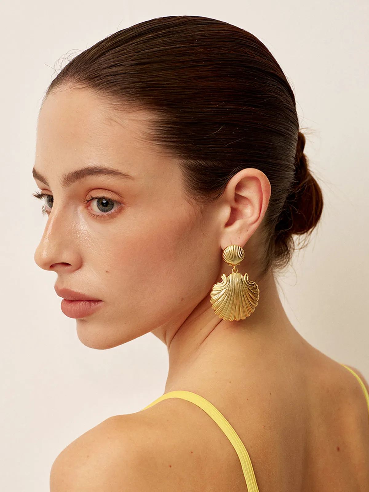 Gold Shell Drop Earrings sold by COMMENSE