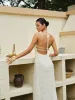 Halter Strappy Back Ruffled Dress sold by COMMENSE