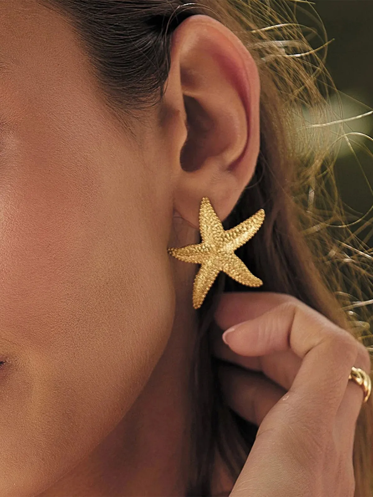 Gold Starfish Stud Earrings sold by COMMENSE