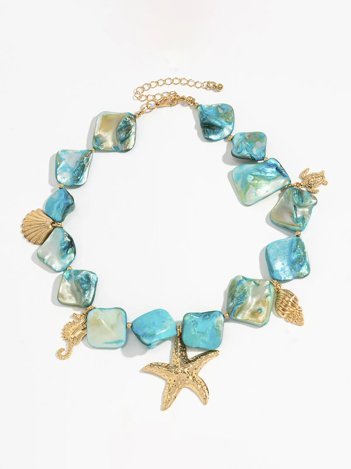 Ocean-Inspired Shell and Starfish Necklace sold by COMMENSE