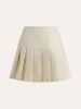 Mid-Waist Pleated Zipper Skirt sold by COMMENSE