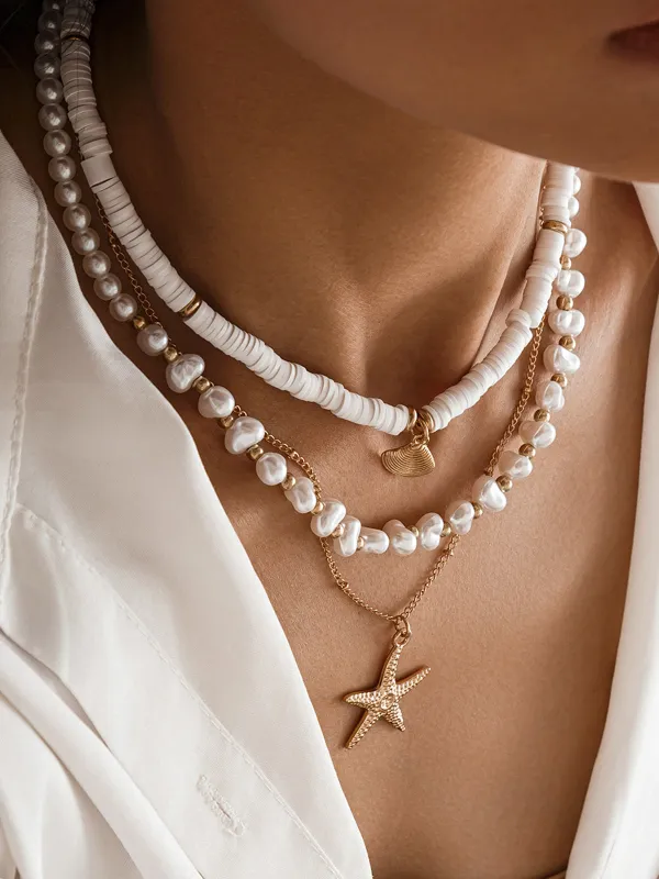 Pearl & Shell Layered Necklace With Starfish Pendant sold by COMMENSE