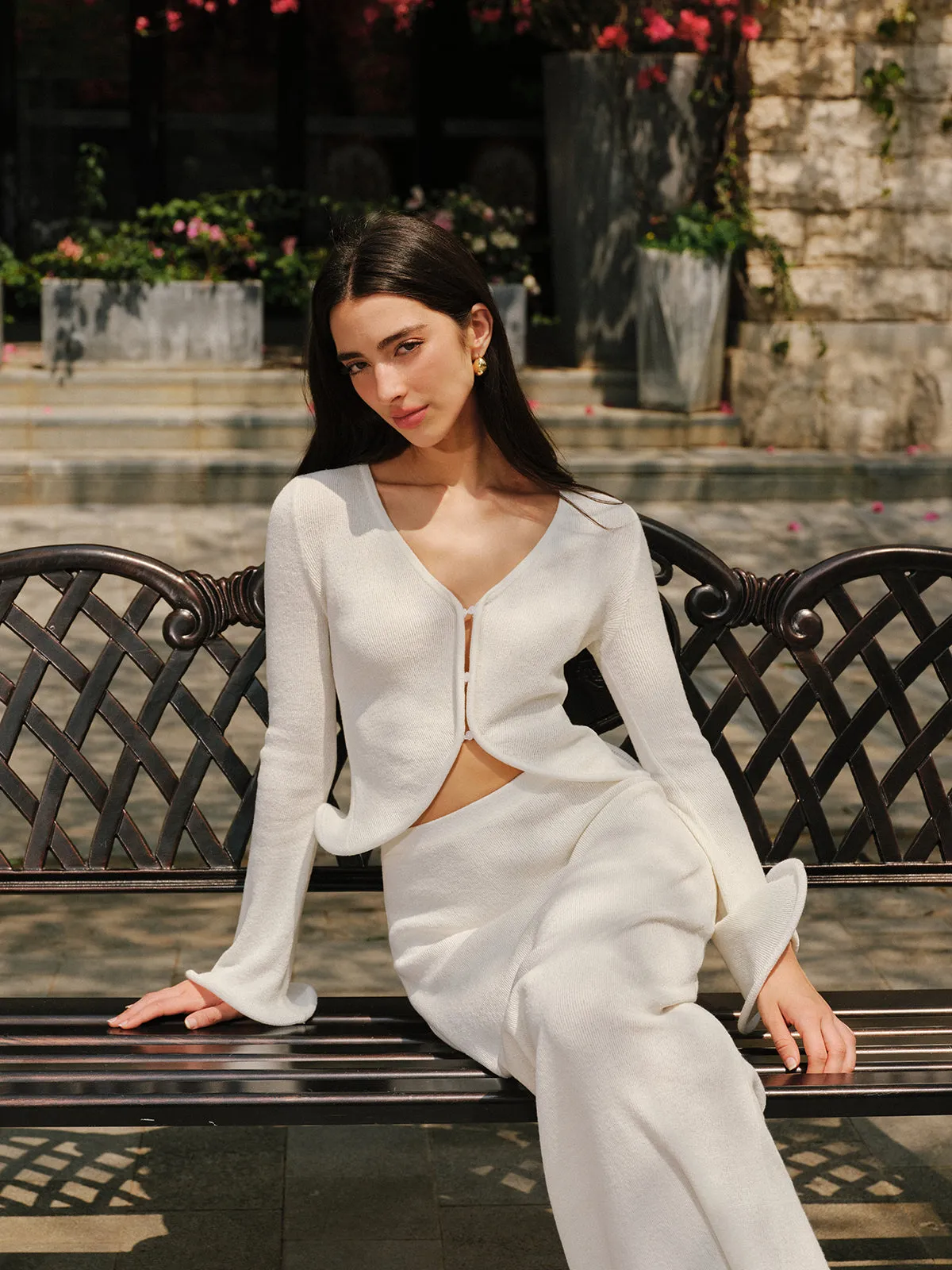 Ruffled Hem Knit Cardigan sold by COMMENSE