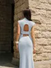 Backless Ribbed Knit Top sold by COMMENSE