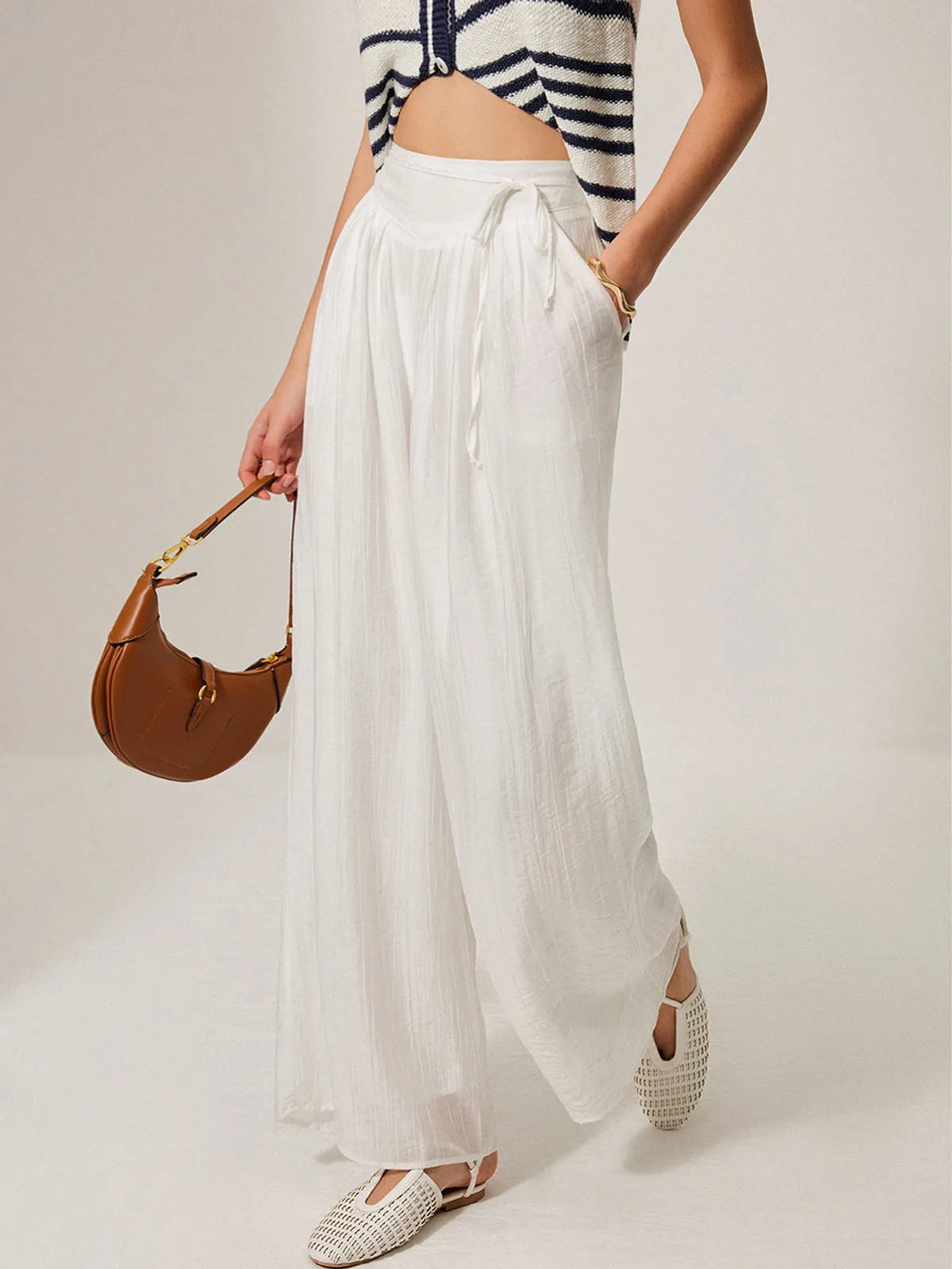 Mid-Waist Pocket Detail Tie Pants sold by COMMENSE