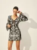 Printed Tie-Front Bell Sleeve Dress sold by COMMENSE