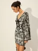 Printed Tie-Front Bell Sleeve Dress sold by COMMENSE