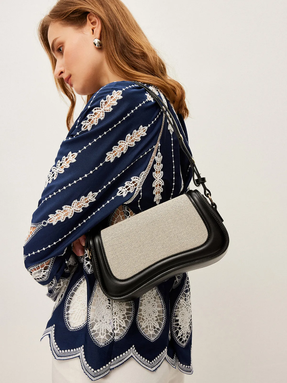 Two-Tone Handbag With Adjustable Strap sold by COMMENSE