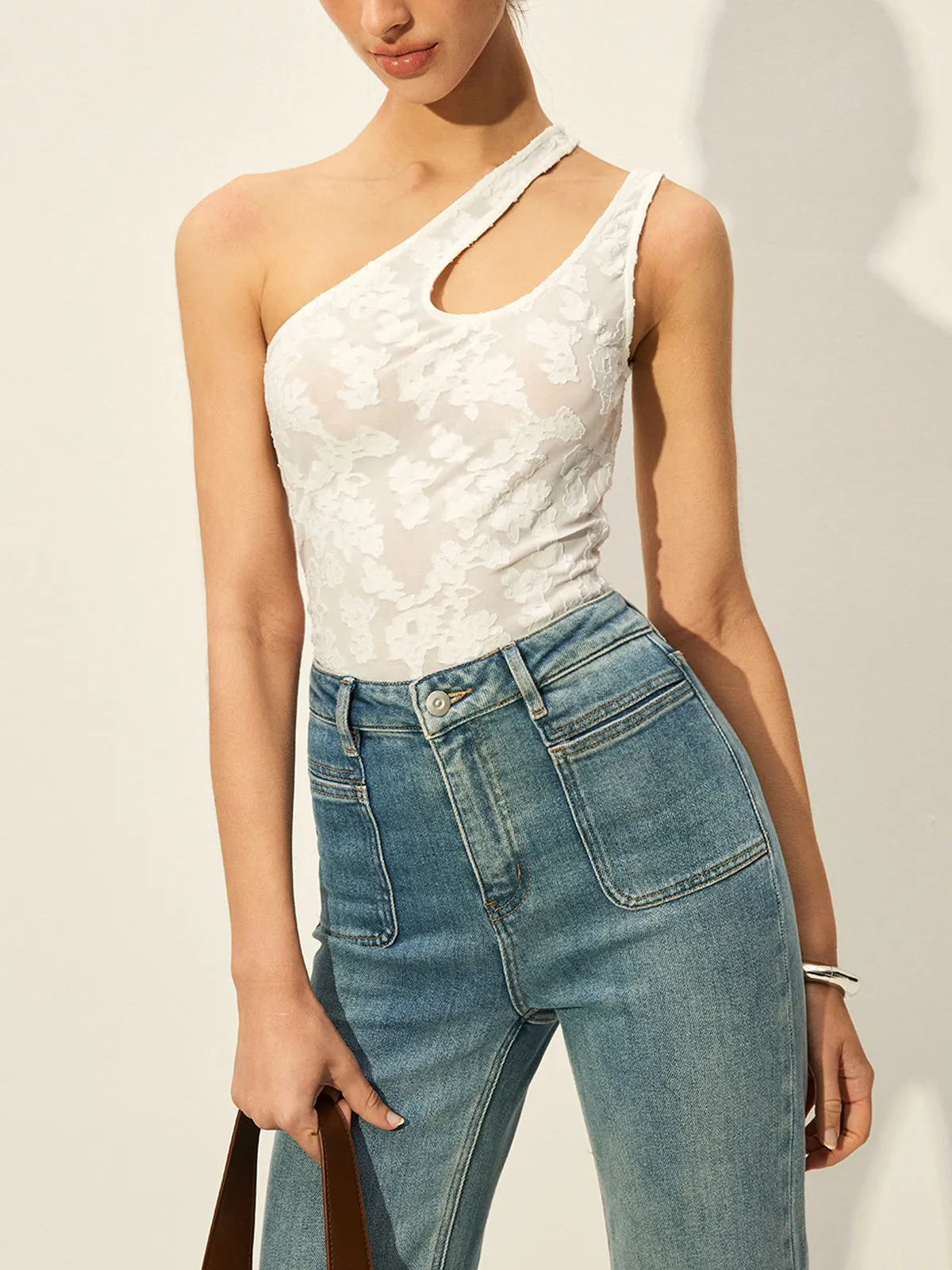 Semi-Sheer One-Shoulder Asymmetrical Cut-Out Embroidery Tank Top sold by COMMENSE
