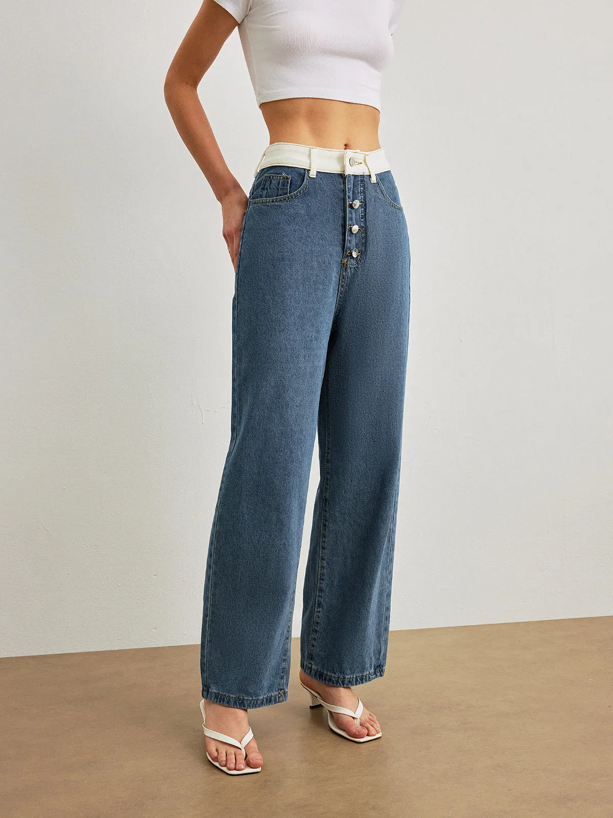 Mid-Waist Contrast Trim Denim Jeans sold by COMMENSE