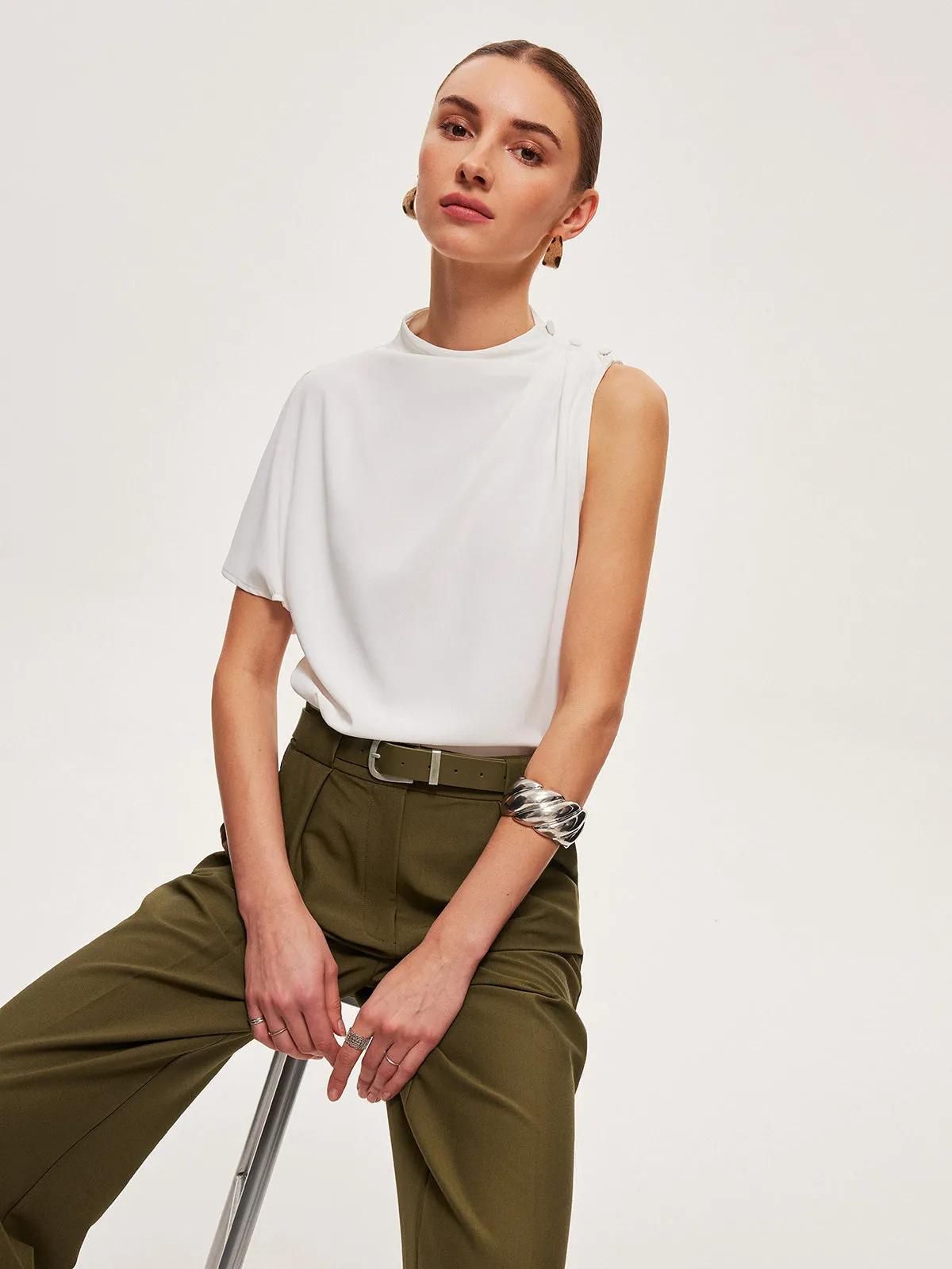Asymmetric Draped Button-Shoulder Top sold by COMMENSE