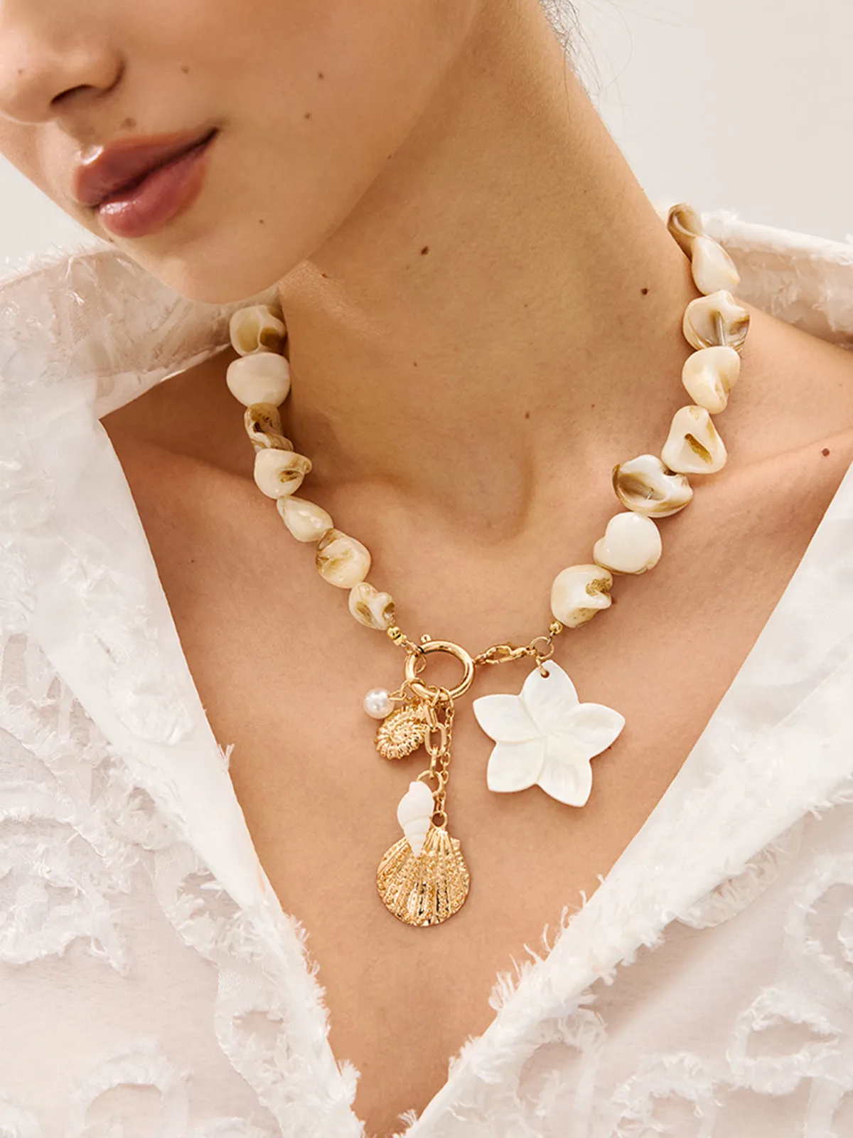 Shell Bead Charm Necklace sold by COMMENSE