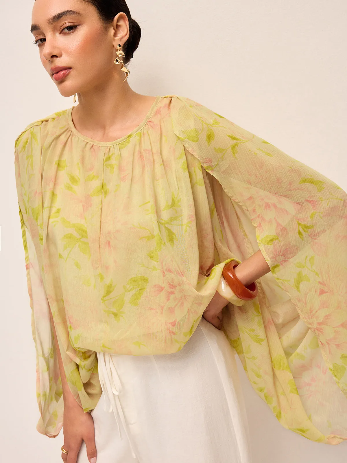 Semi-Sheer Chiffon Floral Drape Sleeve Blouse sold by COMMENSE
