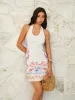 Floral-Printed Halter Neck Tie-Back Mini Dress sold by COMMENSE