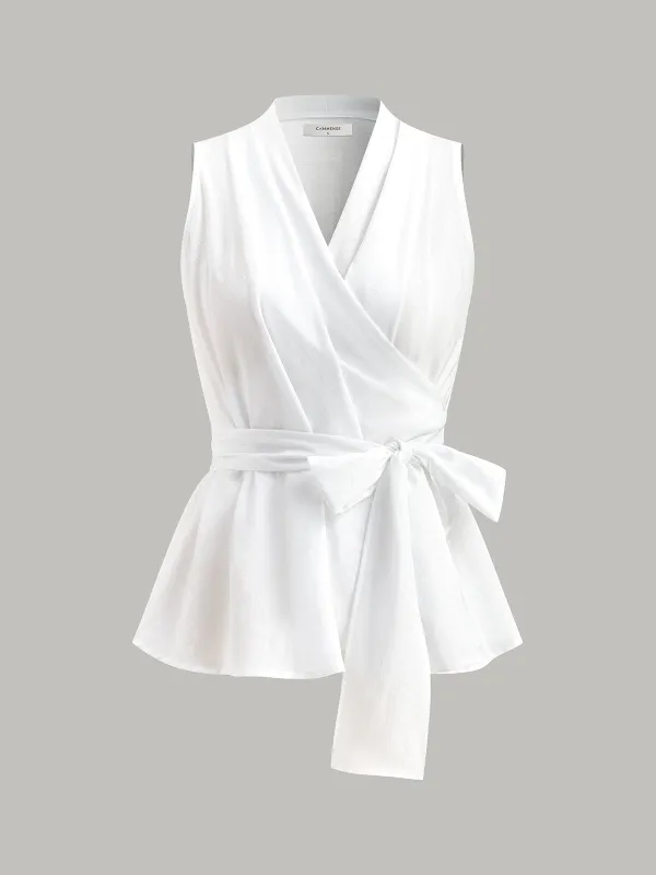 Wrap Tie Peplum Top sold by COMMENSE