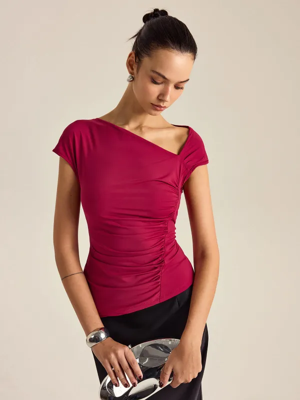 Asymmetrical Design Top sold by COMMENSE