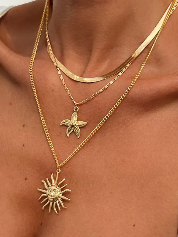 Multi-Layered Gold Sun And Starfish Necklace Set sold by COMMENSE