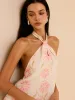 Halter Neck Floral Print Mini Dress sold by COMMENSE