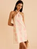 Halter Neck Floral Print Mini Dress sold by COMMENSE