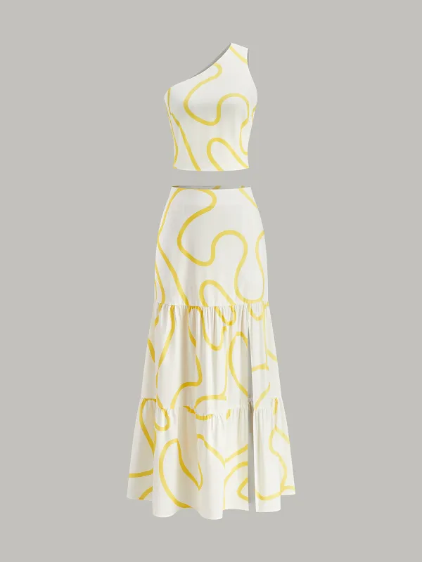 One-Shoulder Abstract Print Crop Top and Tiered Maxi Skirt Set sold by COMMENSE