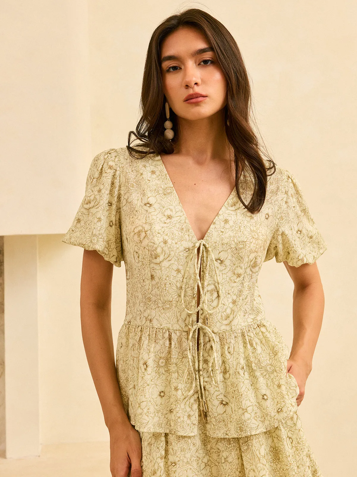 Floral Print Puff Sleeve Peplum Tie-Front Blouse sold by COMMENSE