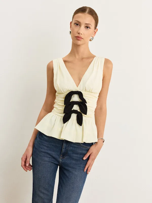 Bow-Detail Ruched Top with Peplum Hem sold by COMMENSE