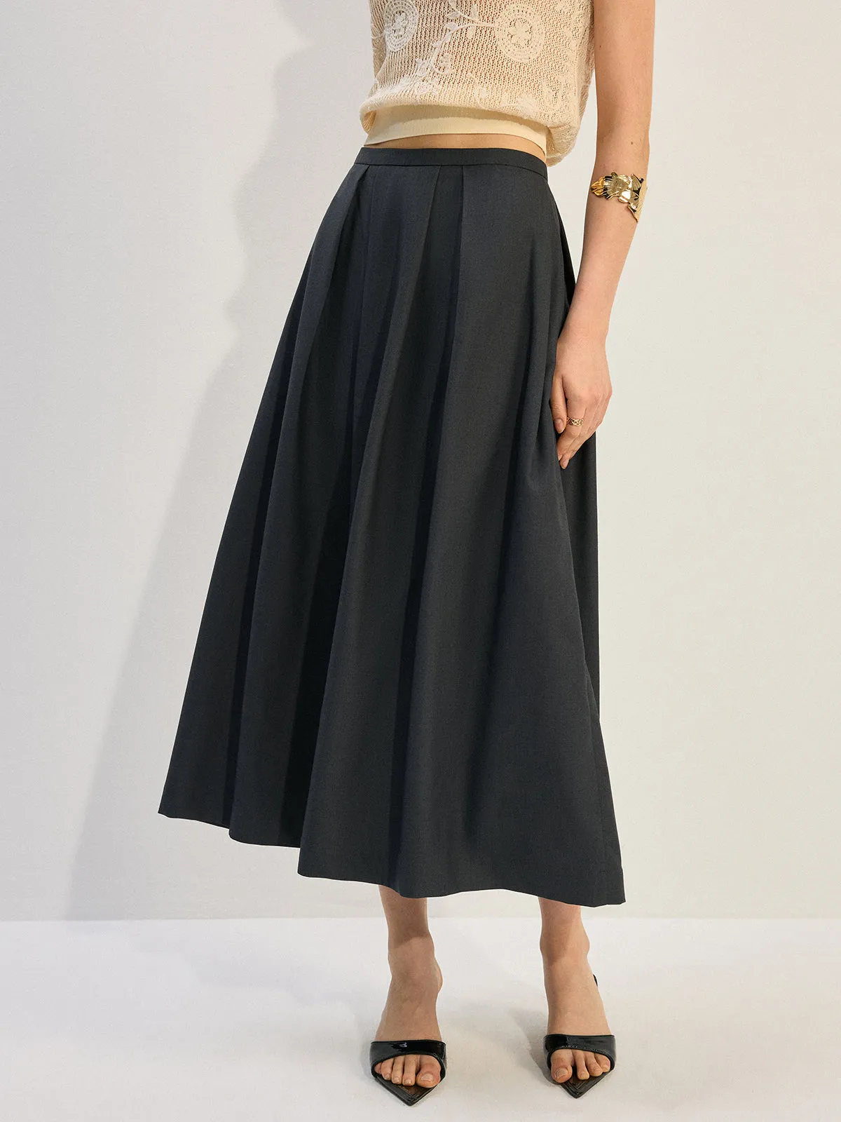 Pleated A-Line Midi Skirt sold by COMMENSE