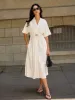 Metal Decor V-Neck Midi Dress sold by COMMENSE