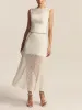 Semi-Sheer Pleated Midi Skirt sold by COMMENSE