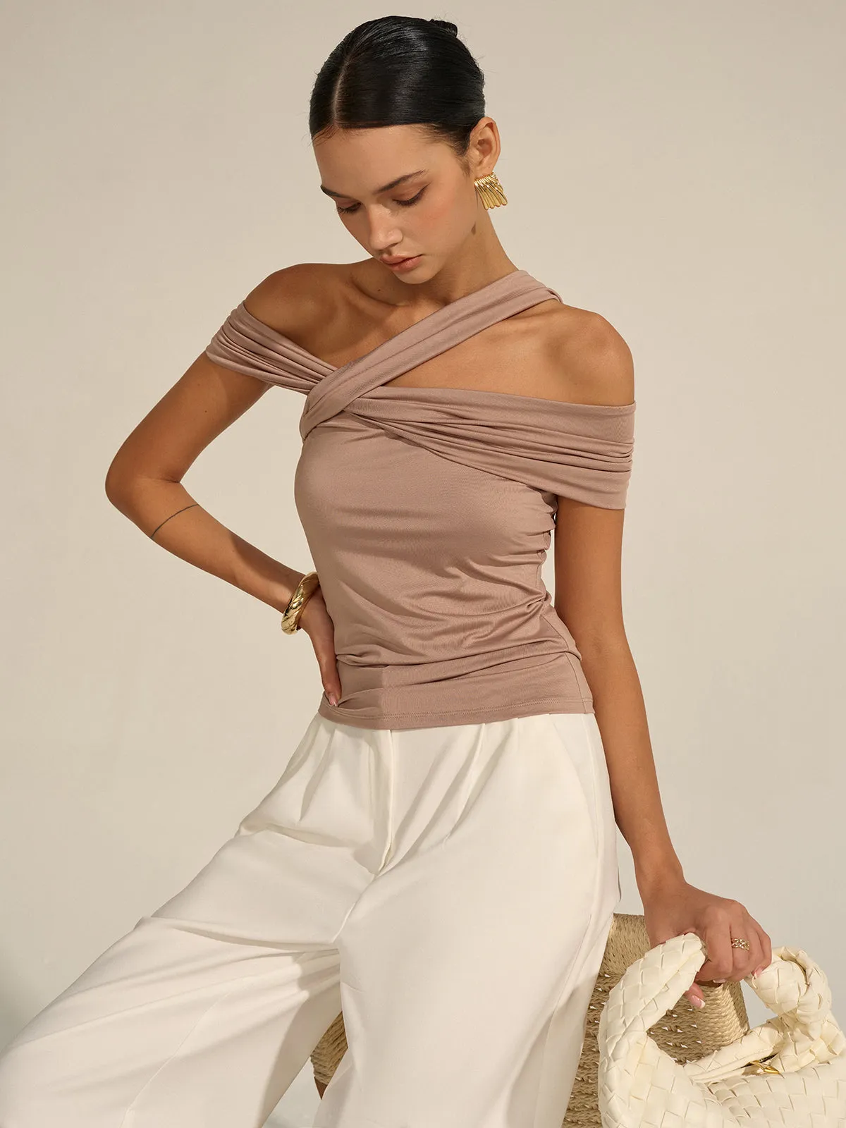 Asymmetrical Twist Off-Shoulder Top sold by COMMENSE