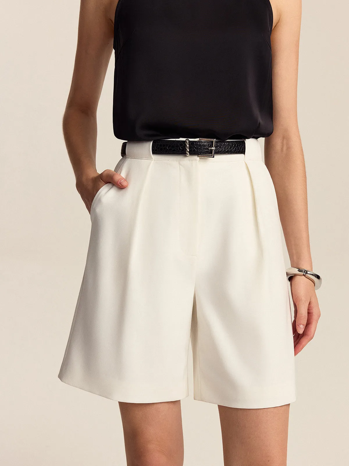 Belted Pleated Mid-Waisted Shorts sold by COMMENSE