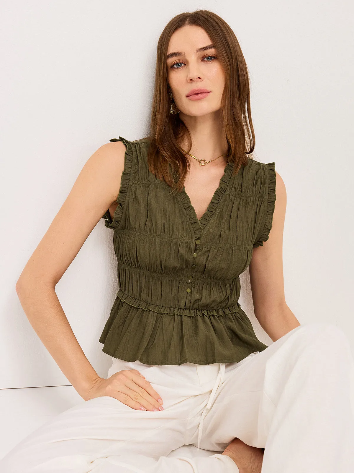 Ruffled V-Neck Peplum Top sold by COMMENSE
