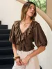 Ruffle V-Neck Puff Sleeve Tencel Blouse sold by COMMENSE