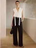 Sleeveless Blouse with Tie-Neckline sold by COMMENSE