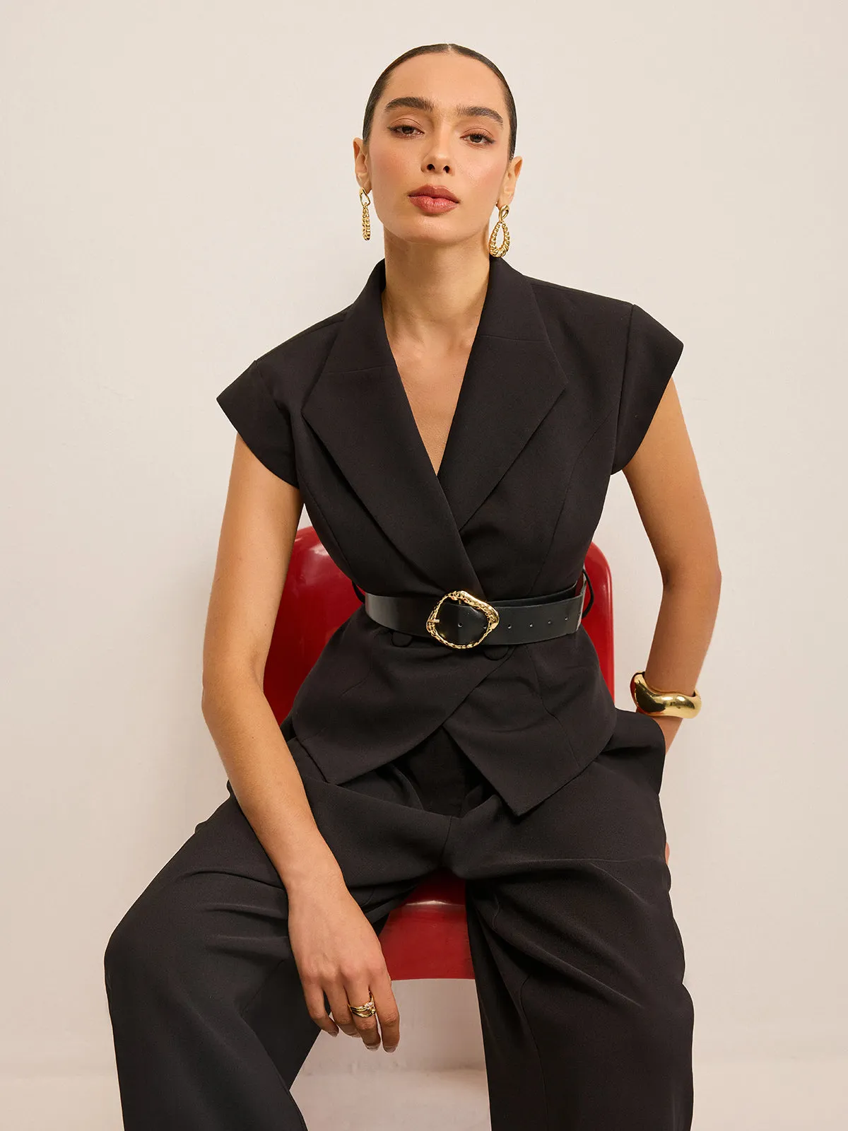 Belted Peplum Vest with Metal Buckle Detail sold by COMMENSE