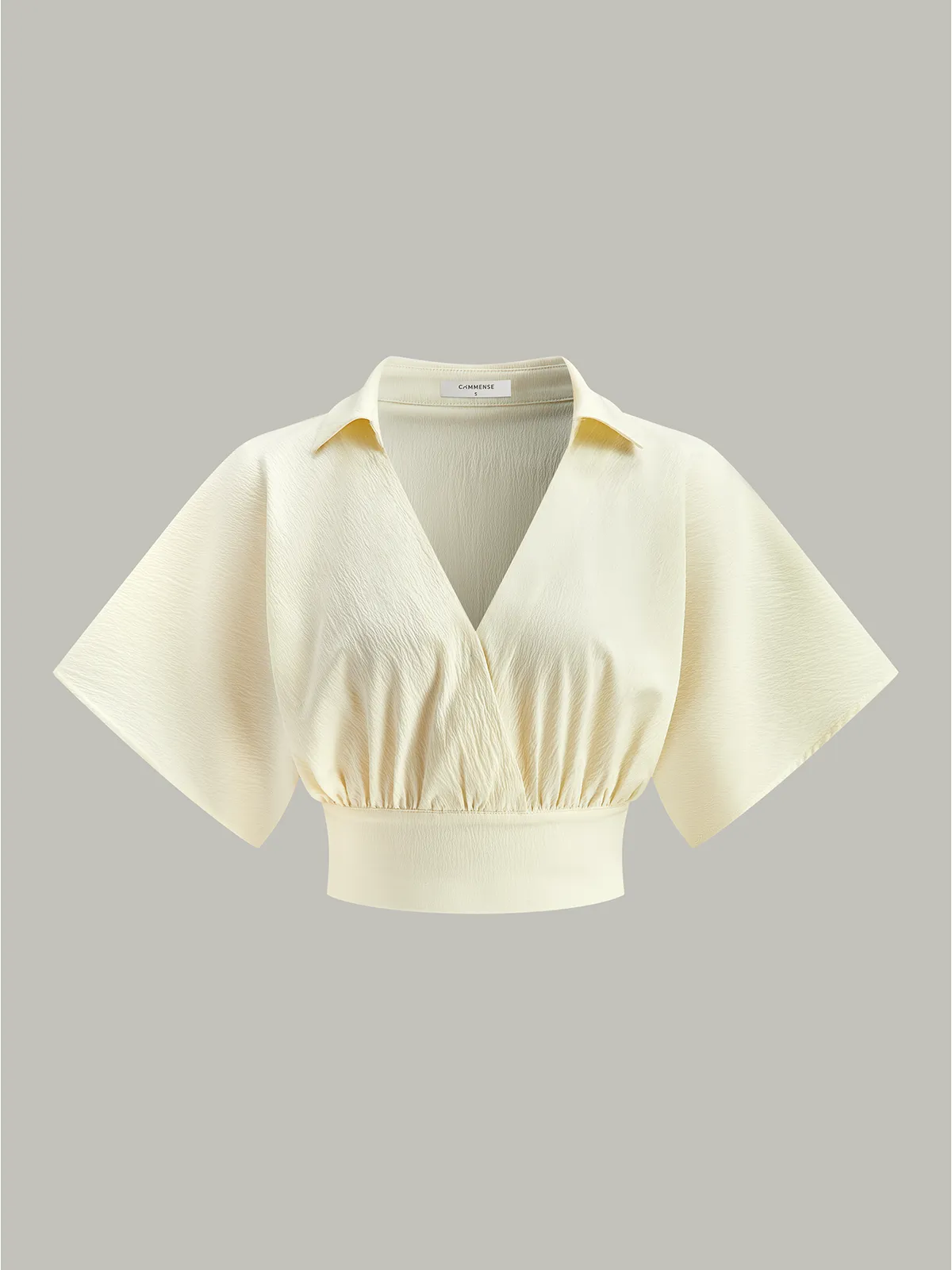 Ruched Short Sleeve Collared Top sold by COMMENSE