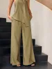 Halter Neck Knot Top and Wide Leg Pants Set sold by COMMENSE