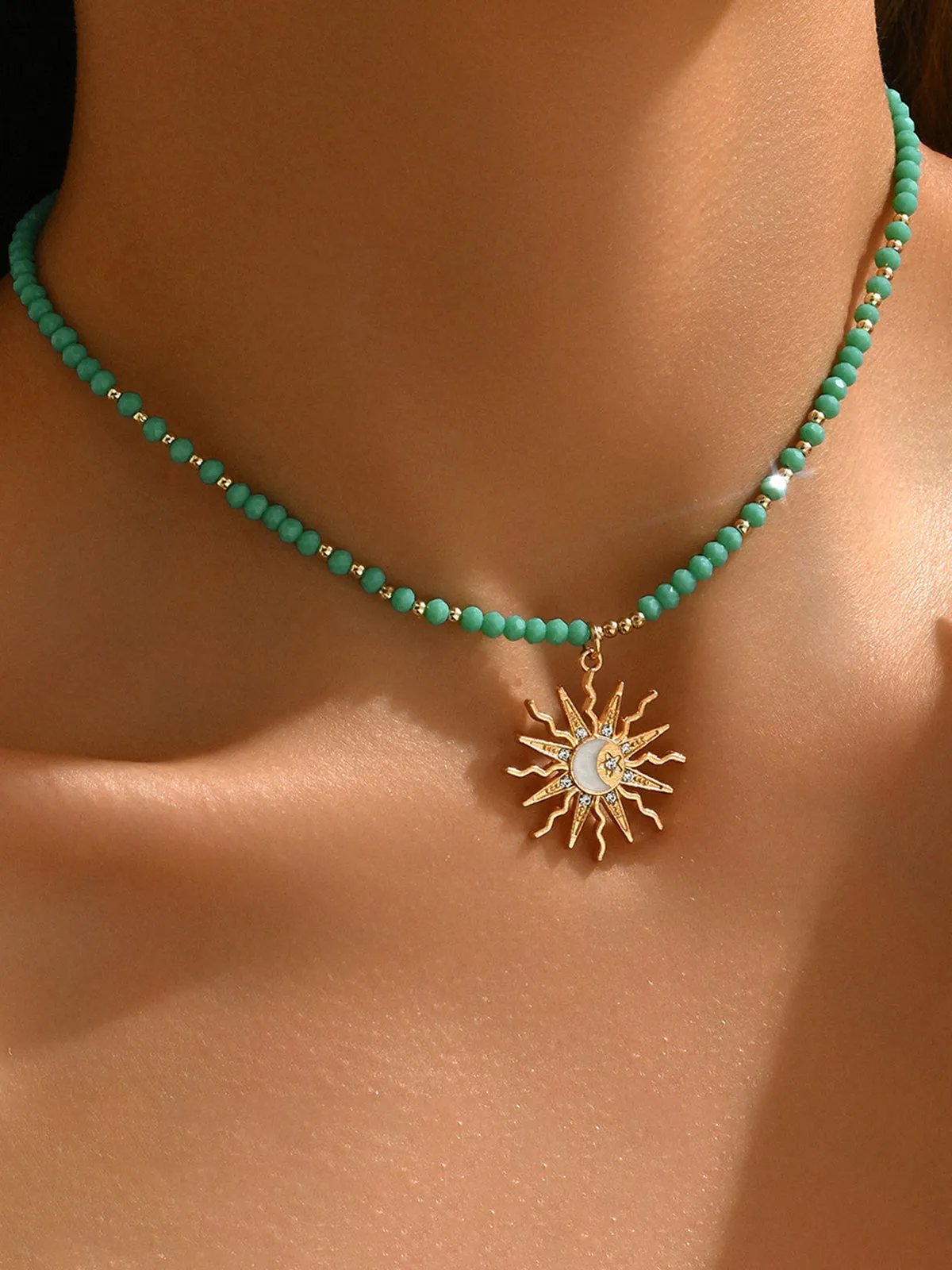 Turquoise Beaded Choker with Sun-Moon Pendant sold by COMMENSE