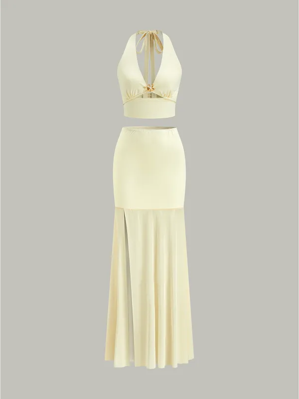 Halter Neck Crop Top and Mesh Paneled Skirt Set sold by COMMENSE