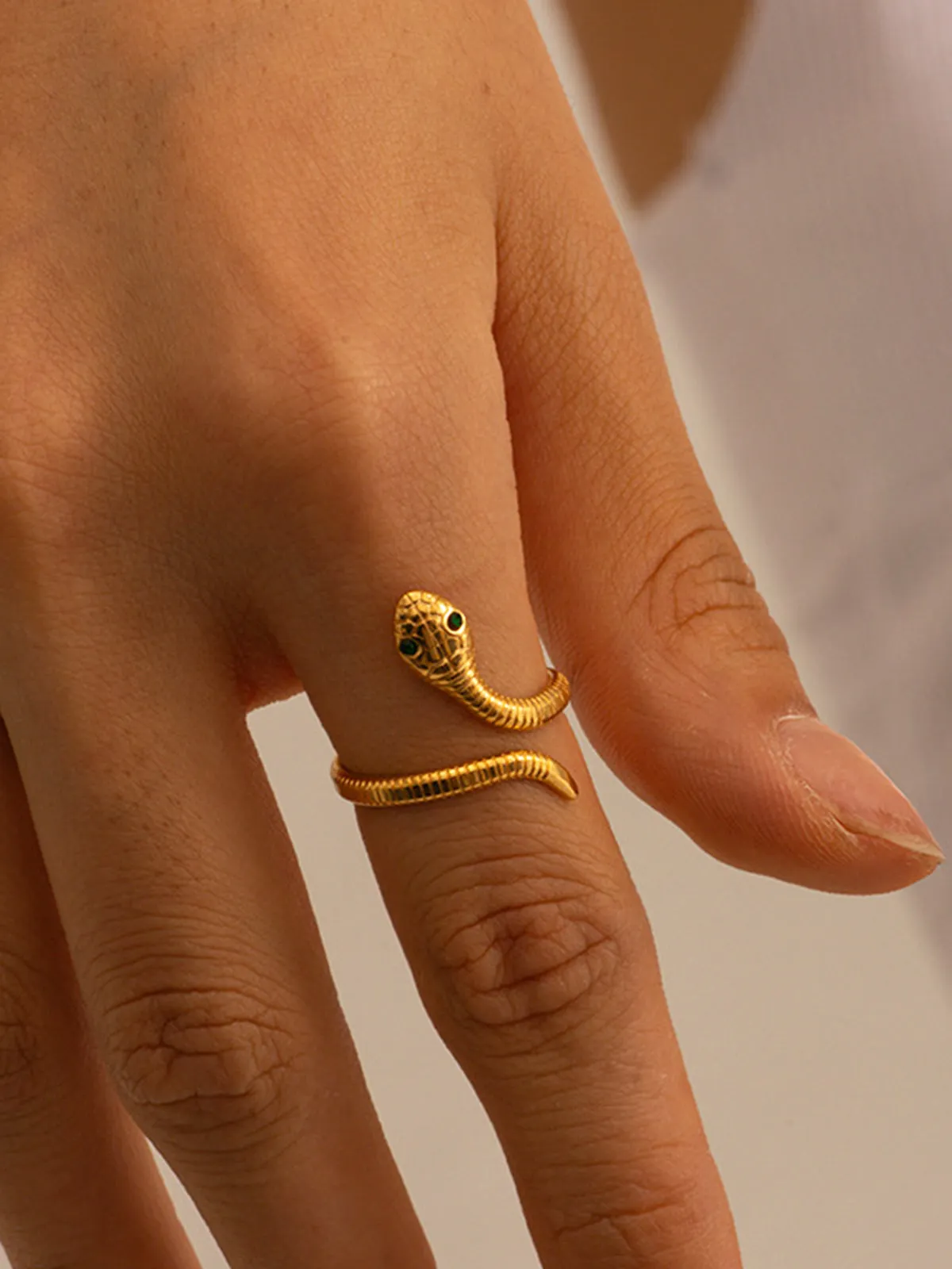 Gold-Toned Snake-Shaped Ring sold by COMMENSE