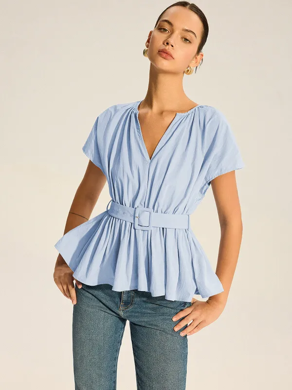 Belted V-Neck Pleated Peplum Top sold by COMMENSE