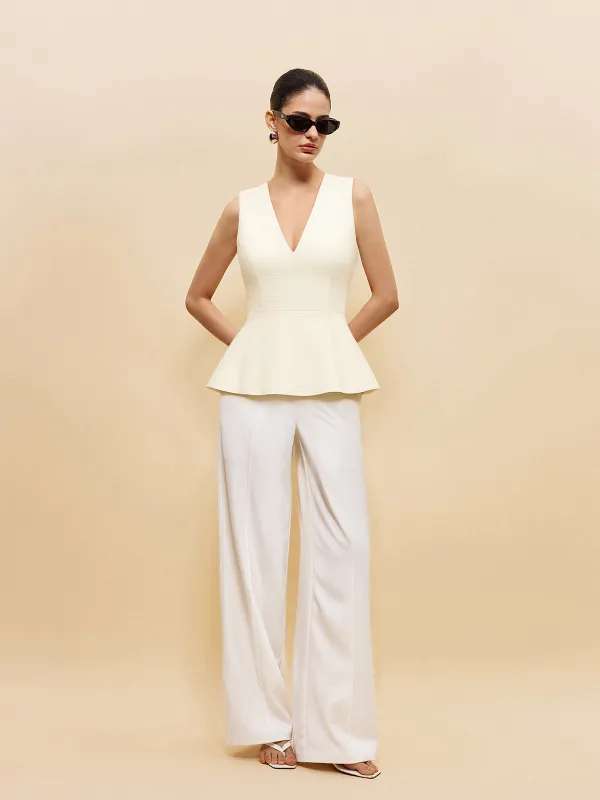 Textured V-Neck Peplum Top sold by COMMENSE