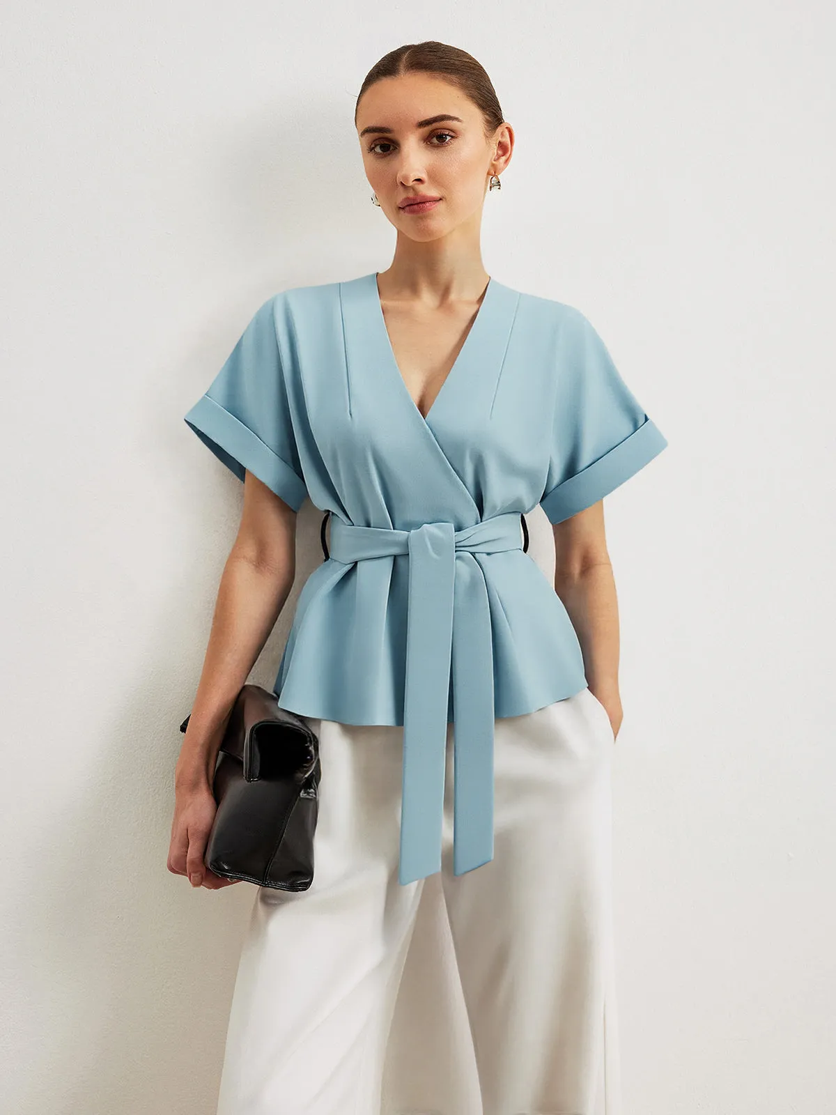 Wrap-Front Belted Blouse sold by COMMENSE